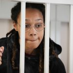 
              WNBA star and two-time Olympic gold medalist Brittney Griner stands in a cage at a court room prior to a hearing, in Khimki just outside Moscow, Russia, Tuesday, July 26, 2022. American basketball star Brittney Griner has returned to a Russian courtroom for her drawn-out trial on drug charges that could bring her 10 years in prison if convicted. (AP Photo/Alexander Zemlianichenko, Pool)
            