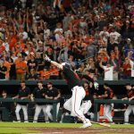 
              Baltimore Orioles designated hitter Trey Mancini gestures while hitting a game-winning single to score Cedric Mullins during the ninth inning of a baseball game against the Los Angeles Angels, Friday, July 8, 2022, in Baltimore. The Orioles won 5-4. (AP Photo/Julio Cortez)
            
