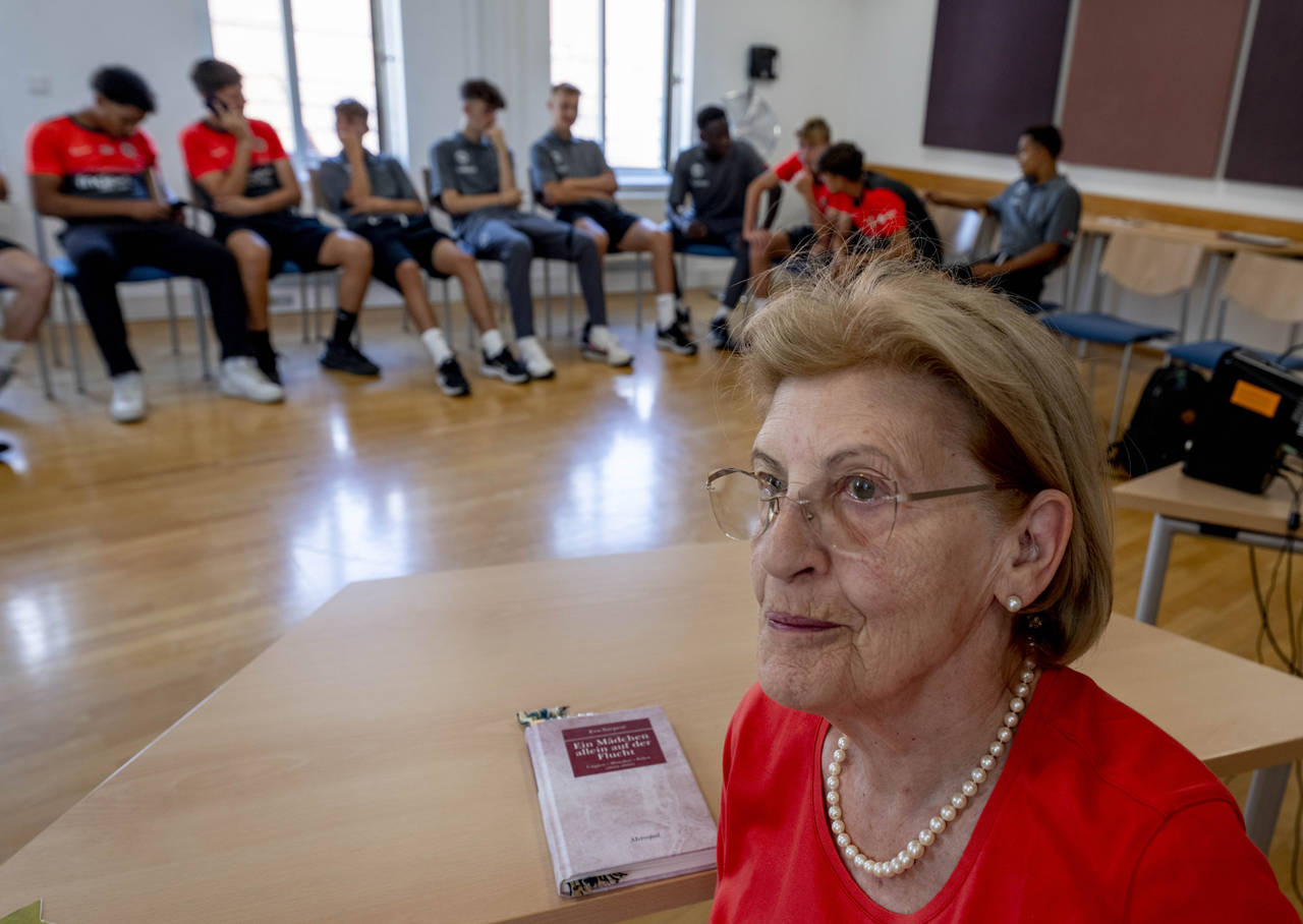 Holocaust survivor Eva Szepesi talks to youth players of Bayern Munich in Nuremberg, Germany, Frida...