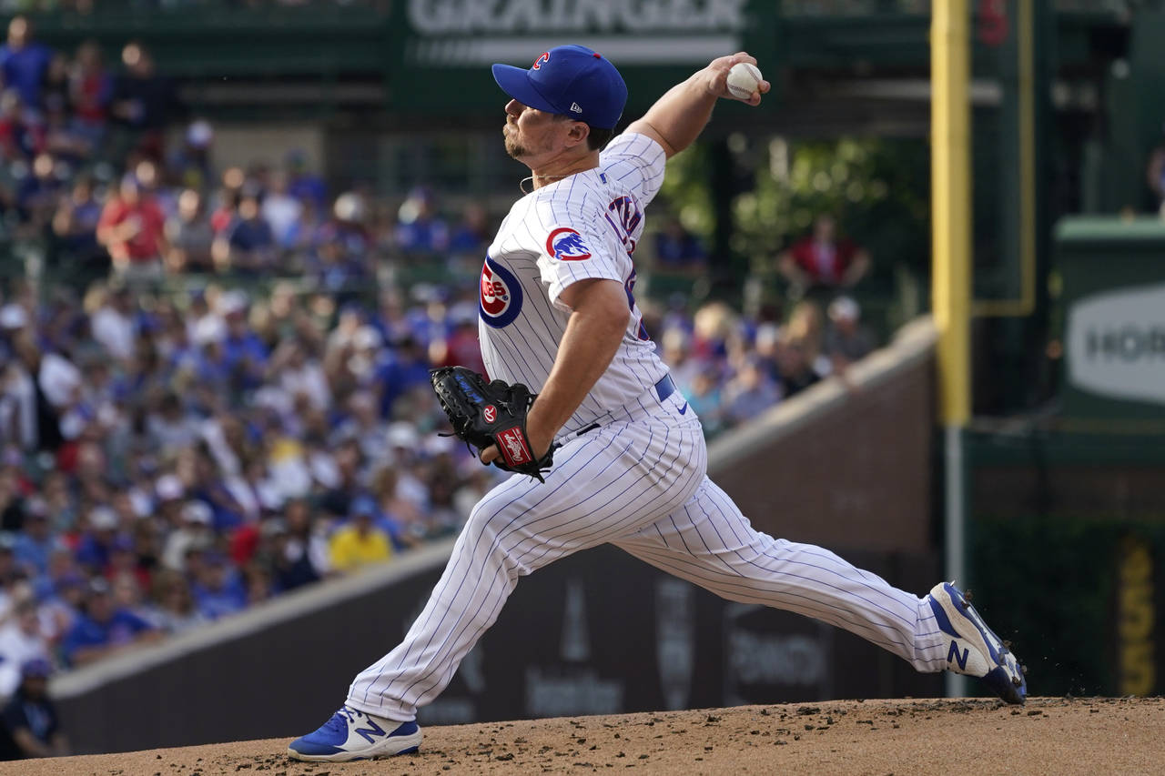Chicago Cubs relief pitcher Mark Leiter Jr., throws against the Boston Red Sox during the first inn...
