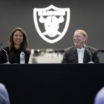 
              Sandra Douglass Morgan, left, smiles with Las Vegas Raiders owner Mark Davis during a news conference announcing Morgan as the new president of the Raiders NFL football team Thursday, July 7, 2022, in Las Vegas. (AP Photo/John Locher)
            
