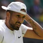 
              Australia's Nick Kyrgios pauses as he plays Brandon Nakashima of the US in a men's singles fourth round match on day eight of the Wimbledon tennis championships in London, Monday, July 4, 2022. (AP Photo/Alberto Pezzali)
            