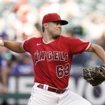 
              Los Angeles Angels starting pitcher Chase Silseth throws against the Texas Rangers during the first inning of a baseball game Saturday, July 30, 2022, in Anaheim, Calif. (AP Photo/Jae C. Hong)
            
