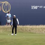 
              U.S golfer Tiger Woods lines up a putt on the 7th green during a practice round at the British Open golf championship on the Old Course at St. Andrews, Scotland, Monday July 11, 2022. The Open Championship returns to the home of golf on July 14-17, 2022, to celebrate the 150th edition of the sport's oldest championship, which dates to 1860 and was first played at St. Andrews in 1873. (AP Photo/Peter Morrison)
            
