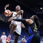 
              Dallas Wings forward Kayla Thornton (6) strips the ball from Indiana Fever forward NaLyssa Smith (1) in the first half of a WNBA basketball game in Indianapolis, Sunday, July 24, 2022. (AP Photo/Michael Conroy)
            