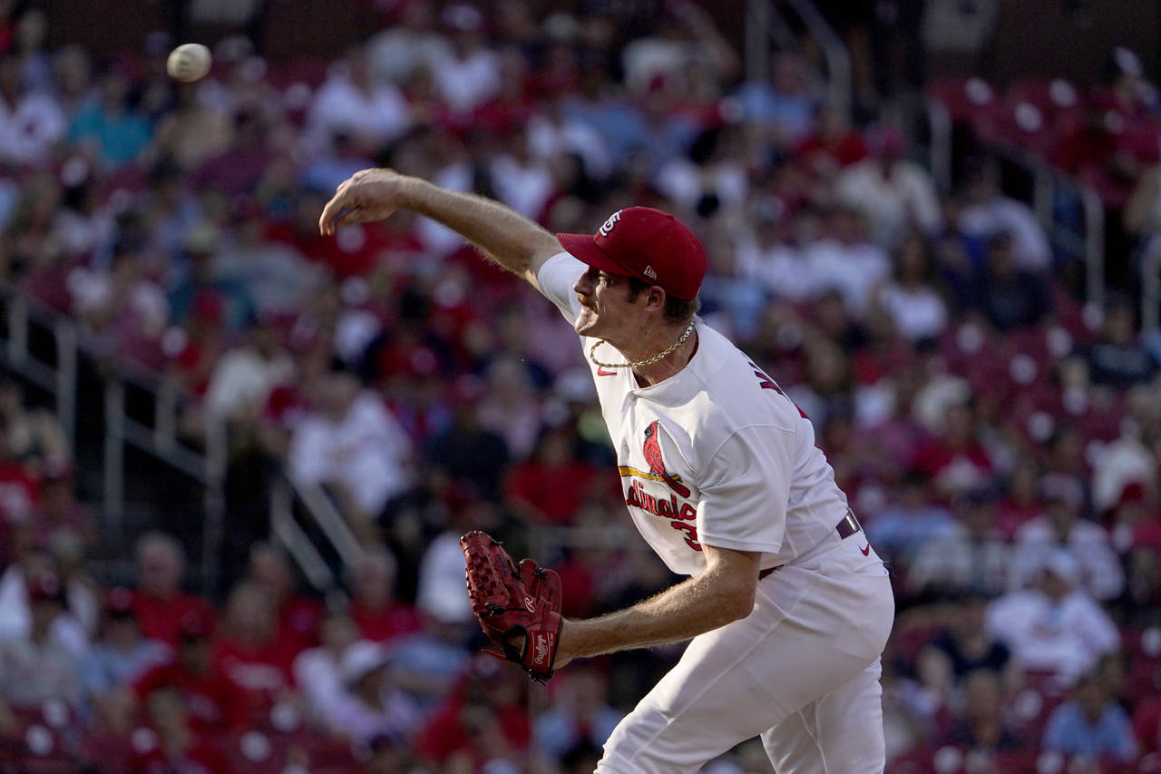 St. Louis Cardinals starting pitcher Miles Mikolas throws during the first inning of a baseball gam...