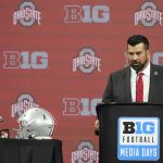 
              Ohio State head coach Ryan Day talks to reporters during an NCAA college football news conference at the Big Ten Conference media days, at Lucas Oil Stadium, Wednesday, July 27, 2022, in Indianapolis. (AP Photo/Darron Cummings)
            