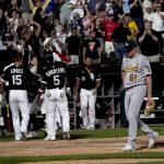 
              Oakland Athletics relief pitcher Zach Jackson walks off the field after Chicago White Sox's Adam Engel (15) scored on Jackson's wild pitch to give the White Sox a 3-2 win during the ninth inning of a baseball game Saturday, July 30, 2022, in Chicago. (AP Photo/Charles Rex Arbogast)
            