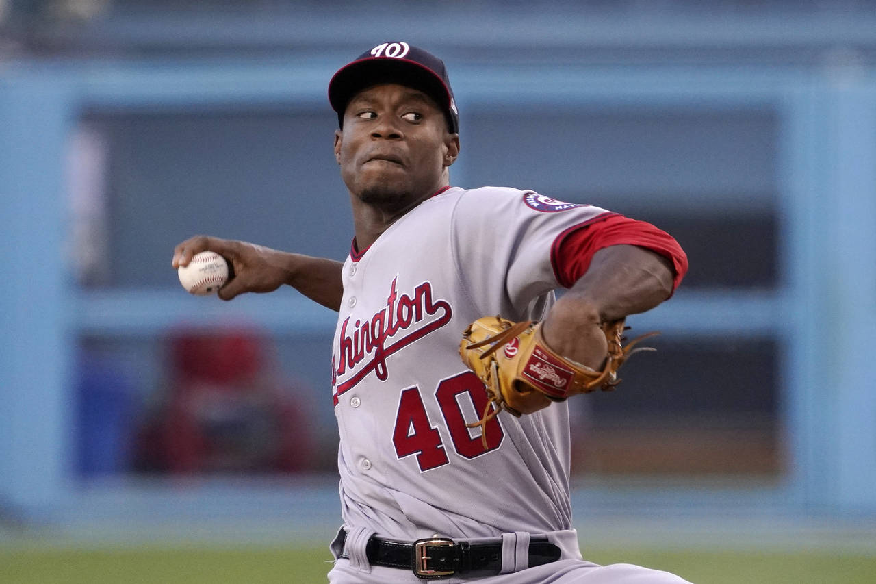 Washington Nationals starting pitcher Josiah Gray throws to the plate during the first inning of a ...
