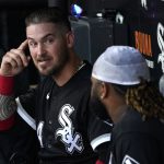 
              Chicago White Sox catcher Yasmani Grandal, left, talks with starting pitcher Johnny Cueto in the dugout during the first inning of a baseball game against the Oakland Athletics Saturday, July 30, 2022, in Chicago. (AP Photo/Charles Rex Arbogast)
            