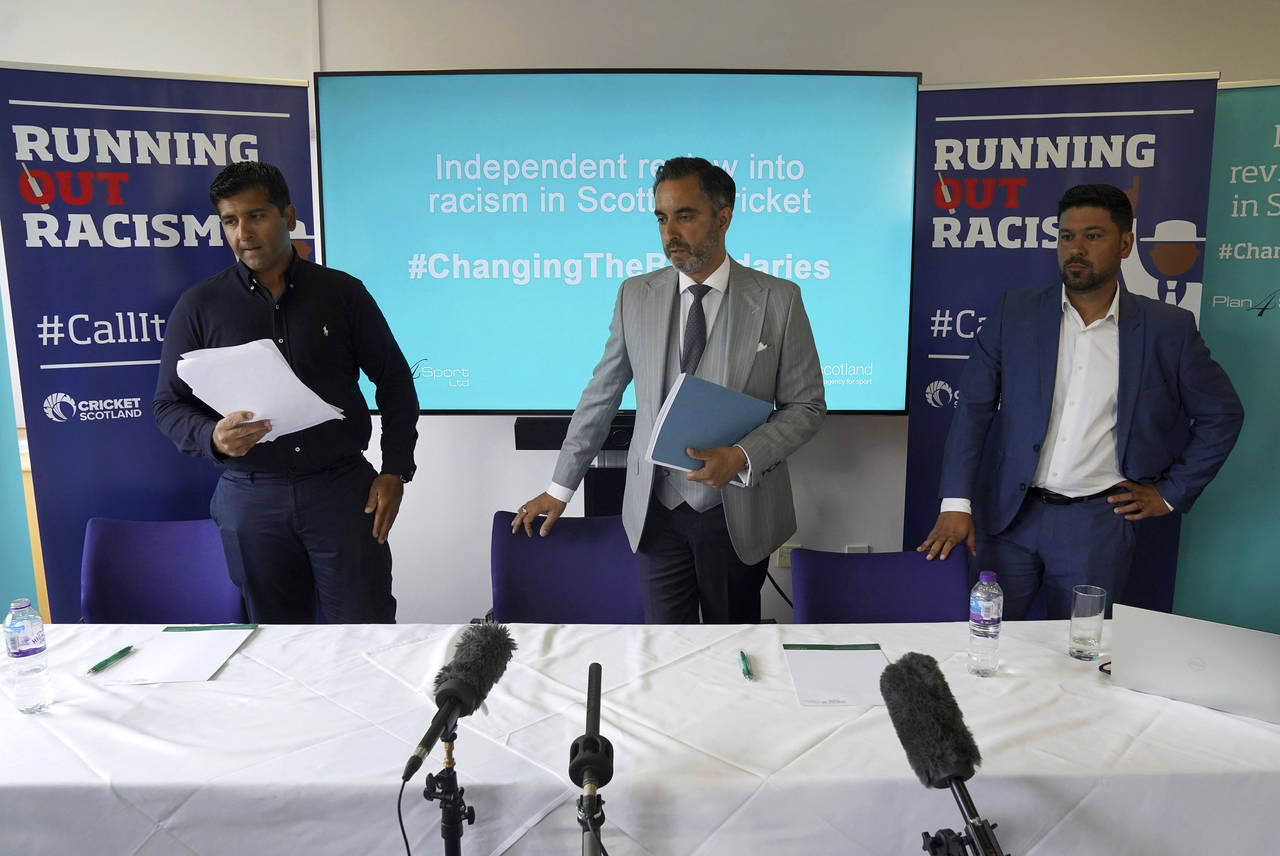 From left, cricketer Majid Haq, lawyer Aamer Anwar and cricketer Qasim Sheikh arrive for a press co...