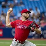 
              Philadelphia Phillies starting pitcher Zack Wheeler (45) throws during the first inning of a baseball game against the Toronto Blue Jays, Wednesday, July 13, 2022 in Toronto. (Christopher Katsarov/The Canadian Press via AP)
            