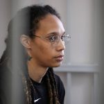 
              WNBA star and two-time Olympic gold medalist Brittney Griner sits in a cage at a court room prior to a hearing, in Khimki just outside Moscow, Russia, Wednesday, July 27, 2022. American basketball star Brittney Griner returned Wednesday to a Russian courtroom for her drawn-out trial on drug charges that could bring her 10 years in prison of convicted. (AP Photo/Alexander Zemlianichenko, Pool)
            