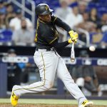 
              Pittsburgh Pirates' Ke'Bryan Hayes hits a RBI single to score Jason Delay during the tenth inning of a baseball game against the Miami Marlins, Wednesday, July 13, 2022, in Miami. The Marlins won 5-4 in ten innings. (AP Photo/Lynne Sladky)
            