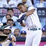 
              American League's Julio Rodriguez, of the Seattle Mariners, bats during the MLB All-Star baseball Home Run Derby, Monday, July 18, 2022, in Los Angeles. (AP Photo/Jae C. Hong)
            