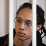 
              WNBA star and two-time Olympic gold medalist Brittney Griner sits in a cage at a court room prior to a hearing, in Khimki just outside Moscow, Russia, Wednesday, July 27, 2022. American basketball star Brittney Griner returned Wednesday to a Russian courtroom for her drawn-out trial on drug charges that could bring her 10 years in prison of convicted. (AP Photo/Alexander Zemlianichenko, Pool)
            