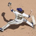 
              Milwaukee Brewers starting pitcher Corbin Burnes throws during the first inning of a baseball game against the Chicago Cubs Wednesday, July 6, 2022, in Milwaukee. (AP Photo/Morry Gash)
            