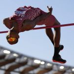 
              Mutaz Essa Barshim, of Qatar, competes during in the men's high jump final at the World Athletics Championships on Monday, July 18, 2022, in Eugene, Ore. (AP Photo/Charlie Riedel)
            