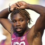 
              Noah Lyles, of the United States, wins a heat in the men's 200-meter run at the World Athletics Championships on Monday, July 18, 2022, in Eugene, Ore. (AP Photo/Ashley Landis)
            