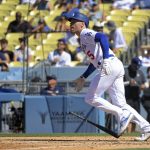 
              Los Angeles Dodgers' Freddie Freeman drops his bat as he hits a solo home run during the sixth inning of a baseball game against the Chicago Cubs Sunday, July 10, 2022, in Los Angeles. (AP Photo/Mark J. Terrill)
            