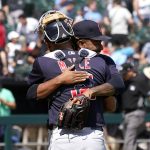 
              Cleveland Guardians relief pitcher Emmanuel Clase, right, celebrates with catcher Luke Maile, the team's win over the Chicago White Sox in the first game of a baseball doubleheader Saturday, July 23, 2022, in Chicago. (AP Photo/Charles Rex Arbogast)
            