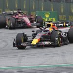 
              Red Bull driver Max Verstappen, bottom, of the Netherlands, steers his car followed by Ferrari driver Charles Leclerc, of Monaco, during the Austrian F1 Grand Prix at the Red Bull Ring racetrack in Spielberg, Austria, Sunday, July 10, 2022. (AP Photo/Matthias Schrader)
            