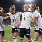 
              Germany's Alexandra Popp, second right, celebrates scoring her side's second goal during the Women Euro 2022 semifinal soccer match between Germany and France at Stadium MK in Milton Keynes, England, Wednesday, July 27, 2022. (Nick Potts/PA via AP)
            
