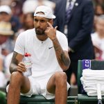 
              Australia's Nick Kyrgios sits in his chair during a break in a men's singles quarterfinal match against Chile's Cristian Garin on day ten of the Wimbledon tennis championships in London, Wednesday, July 6, 2022. (AP Photo/Alberto Pezzali)
            