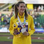 
              Silver medalist Yaroslava Mahuchikh, of Ukraine, poses on the podium after the women's high jump final at the World Athletics Championships on Tuesday, July 19, 2022, in Eugene, Ore. (AP Photo/Gregory Bull)
            