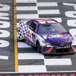 
              ADDS THAT HAMLIN WAS LATER DISQUALIFIED - Taylor James Hamlin, left, waves the checkered flag from inside the car with her dad, Denny Hamlin, after he won a NASCAR Cup Series auto race at Pocono Raceway, Sunday, July 24, 2022, in Long Pond, Pa. (AP Photo/Matt Slocum)
            