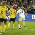 
              FILE - England's Alessia Russo, second right, scores her side's 3rd goal during the Women Euro 2022 semi final soccer match between England and Sweden at Bramall Lane Stadium in Sheffield, England, Tuesday, July 26, 2022. (AP Photo/Jon Super, File)
            