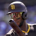 
              San Diego Padres' Jurickson Profar gets ready to bat during the first inning of the team's baseball game against the Los Angeles Dodgers on Saturday, July 2, 2022, in Los Angeles. (AP Photo/Mark J. Terrill)
            