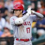 
              Los Angeles Angels designated hitter Shohei Ohtani stands at the on deck circle during the third inning of a baseball game against the Baltimore Orioles, Thursday, July 7, 2022, in Baltimore. (AP Photo/Julio Cortez)
            