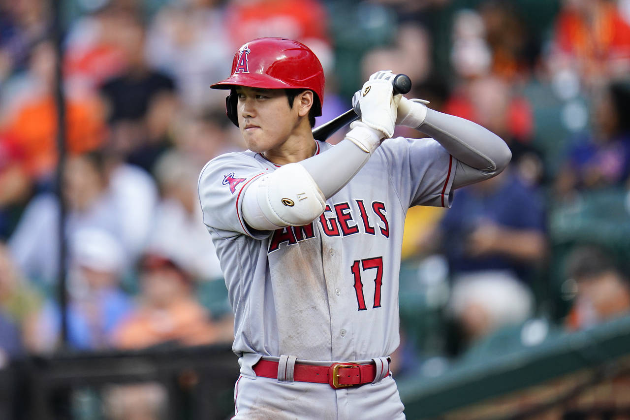 Los Angeles Angels designated hitter Shohei Ohtani stands at the on deck circle during the third in...
