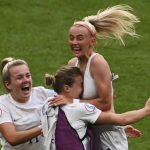 
              England's Chloe Kelly, right, celebrates with teammates after scoring her side's second goal during the Women's Euro 2022 final soccer match between England and Germany at Wembley stadium in London, Sunday, July 31, 2022. (AP Photo/Rui Vieira)
            