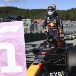 
              Red Bull driver Max Verstappen of the Netherlands leaves his car after he clocked the fastest time during the qualifying session at the Red Bull Ring racetrack in Spielberg, Austria, Friday, July 8, 2022. The Austrian F1 Grand Prix will be held on Sunday July 10, 2022. (Christian Bruna/Pool via AP)
            