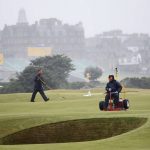 
              FILE - Workers are shown tending to the 17th green on the Old Course, St Andrews, Scotland, Saturday, July, 10, 2010. The Open Championship returns to the home of golf on July 14-17 to celebrate the 150th edition of the sport's oldest championship, which dates to 1860 and was first played at St. Andrews in 1873. (AP Photo/Peter Morrison, File)
            