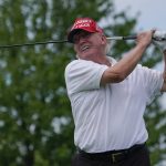 
              Former President Donald Trump plays during the pro-am round of the Bedminster Invitational LIV Golf tournament in Bedminster, NJ., Thursday, July 28, 2022. (AP Photo/Seth Wenig)
            