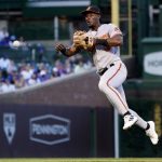 
              Baltimore Orioles shortstop Jorge Mateo throws out Chicago Cubs' Rafael Ortega at first, during the third inning of a baseball game Tuesday, July 12, 2022, in Chicago. (AP Photo/Charles Rex Arbogast)
            