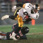 
              FILE - Pittsburgh Steelers' Charles Johnson (81) comes down with a 13-yard reception from quarterback Neil O'Donnell as Chicago Bears' Barry Minter (92) defends during overtime in an NFL football game Nov. 5, 1995, in Chicago. The catch and yardage on the drive helped to set up the game-winning field goal in the Steelers' 37-34 win. Johnson, the former Colorado receiver who won a Super Bowl title with New England in his nine-year NFL career, has died. He was 50. The university confirmed Johnson's death Wednesday, July 20, 2022, through Heritage High School, the Wake Forest school where he was an assistant athletic director. (AP Photo/Michael S. Green, File)
            