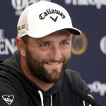 
              Spain's golfer Jon Rahm sp[eaks during a press conference at the British Open golf championship in St Andrews, Scotland, Tuesday, July 12, 2022. The Open Championship returns to the home of golf on July 14-17, 2022, to celebrate the 150th edition of the sport's oldest championship, which dates to 1860 and was first played at St. Andrews in 1873. (AP Photo/Peter Morrison)
            