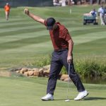 
              Tony Romo reacts after sinking the winning putt on the 18th hole during the final round of the American Century Celebrity Championship golf tournament at Edgewood Tahoe Golf Course in Stateline, Nev., Sunday, July 10, 2022. (AP Photo/Tom R. Smedes)
            