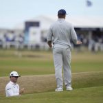 
              Zach Johnson of the US, left, and Bryson DeChambeau of the US on the 17th hole during a practice round at the British Open golf championship on the Old Course at St. Andrews, Scotland, Wednesday July 13, 2022. The Open Championship returns to the home of golf on July 14-17, 2022, to celebrate the 150th edition of the sport's oldest championship, which dates to 1860 and was first played at St. Andrews in 1873. (AP Photo/Alastair Grant)
            