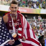 
              Bronze medalist Trevor Bassitt, of the United States, celebrates after the men's 400-meter hurdles final at the World Athletics Championships on Tuesday, July 19, 2022, in Eugene, Ore.(AP Photo/Charlie Riedel)
            