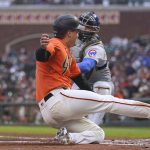 
              San Francisco Giants' Wilmer Flores is tagged out at home by Chicago Cubs catcher Willson Contreras during the first inning of a baseball game in San Francisco, Friday, July 29, 2022. (AP Photo/Godofredo A. Vásquez)
            