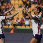 
              United States' Alex Morgan, right, celebrates with teammate Rose Lavelle scoring her side's second goal against Haiti during a CONCACAF Women's Championship soccer match in Monterrey, Mexico, Monday, July 4, 2022. (AP Photo/Fernando Llano)
            