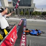 
              Scott Dixon, of New Zealand, crosses the finish line to win an IndyCar auto race in Toronto, Sunday, July 17, 2022. (Andrew Lahodynskyj/The Canadian Press via AP)
            