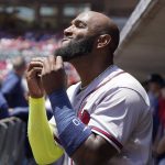 
              Atlanta Braves' Marcell Ozuna stands in the dugout during the first inning of the team's baseball game against the Cincinnati Reds, Sunday, July 3, 2022, in Cincinnati. (AP Photo/Jeff Dean)
            