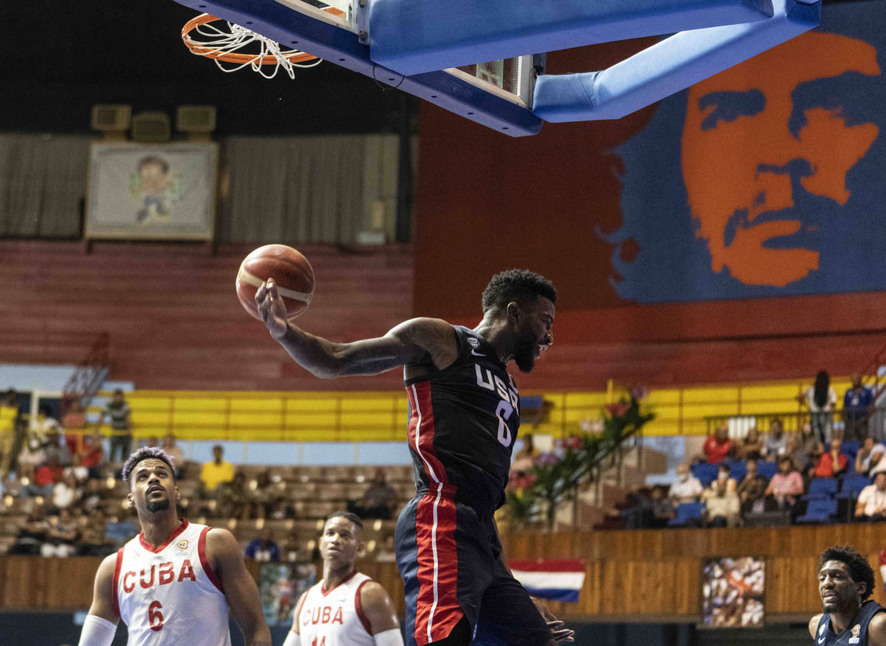 Jordan Bell of the U.S. reacts after dunking the ball against Cuba during the FIBA Americas qualifi...