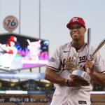 
              National League's Juan Soto, of the Washington Nationals, holds the winner's trophy after the MLB All-Star baseball Home Run Derby, Monday, July 18, 2022, in Los Angeles. (AP Photo/Mark J. Terrill)
            